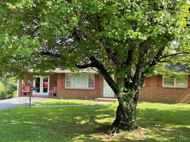 2685 Dearing Ford Rd, Altavista, VA 24517 - obstructed view of property with a front yard and brick siding