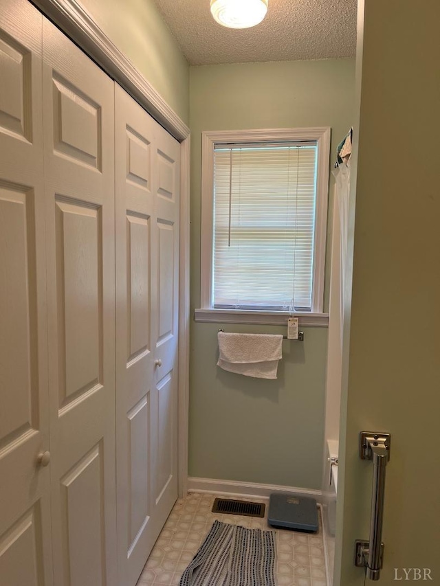 7084 Hunting Creek Rd, Nathalie, VA 24577 - doorway to outside featuring light floors and a textured ceiling