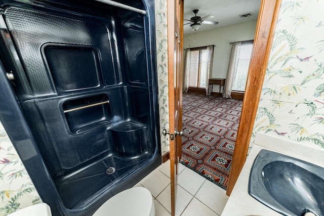 full bath with tile patterned floors, toilet, a sink, a ceiling fan, and visible vents