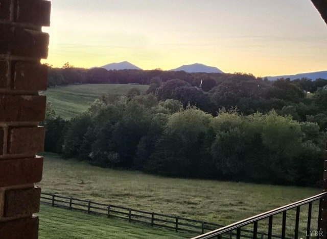 property view of mountains featuring a rural view