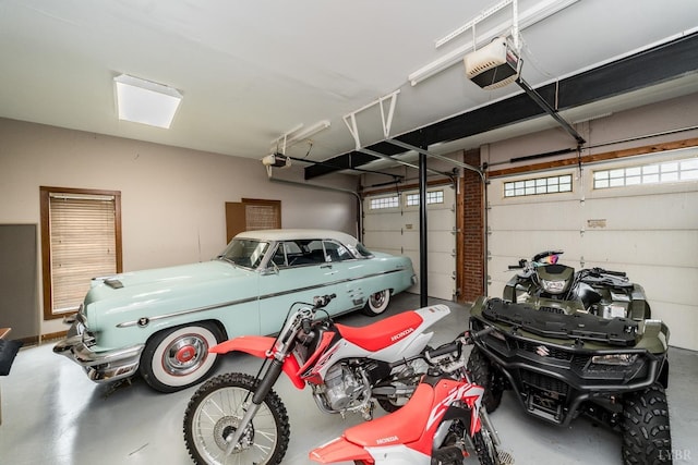 garage featuring a garage door opener