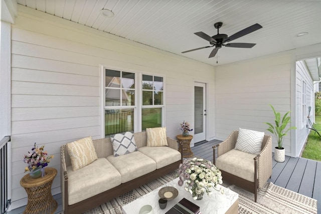 exterior space featuring outdoor lounge area and a ceiling fan