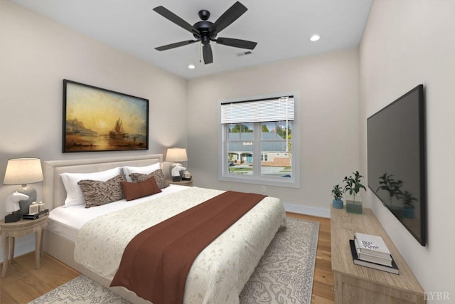 bedroom with ceiling fan, light wood-style flooring, baseboards, and recessed lighting