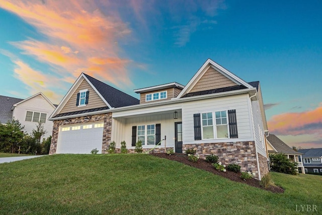 craftsman-style home with stone siding, a standing seam roof, and a front lawn