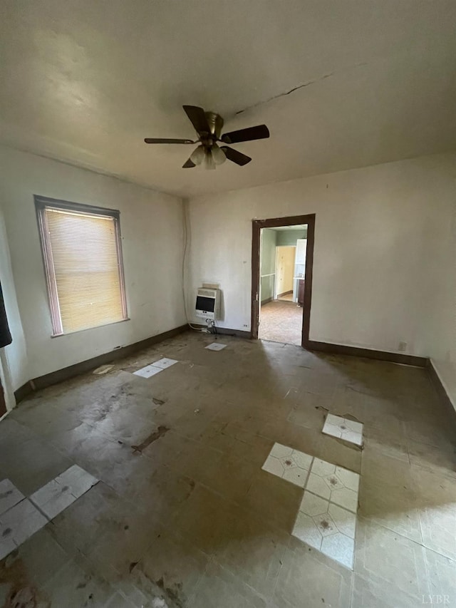 500 Amherst St, Lynchburg, VA 24504 - unfurnished living room with heating unit, baseboards, and ceiling fan