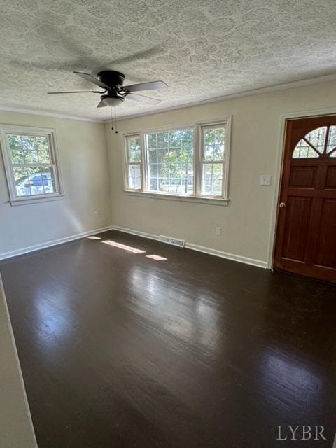 305 Eldon Rd, Appomattox, VA 24522 - foyer featuring visible vents, dark wood-type flooring, a textured ceiling, baseboards, and ceiling fan