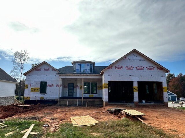 unfinished property featuring a porch