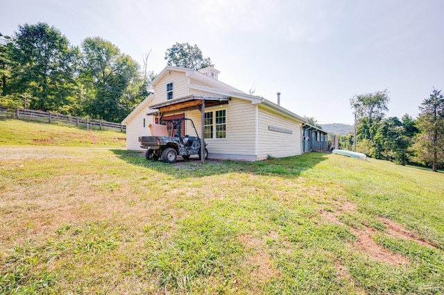 1343 Wares Gap Rd, Monroe, VA 24574 - exterior space with a lawn, fence, and a garage