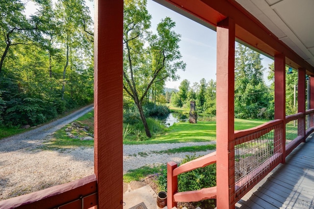 1343 Wares Gap Rd, Monroe, VA 24574 - wooden terrace with a water view, a lawn, and covered porch