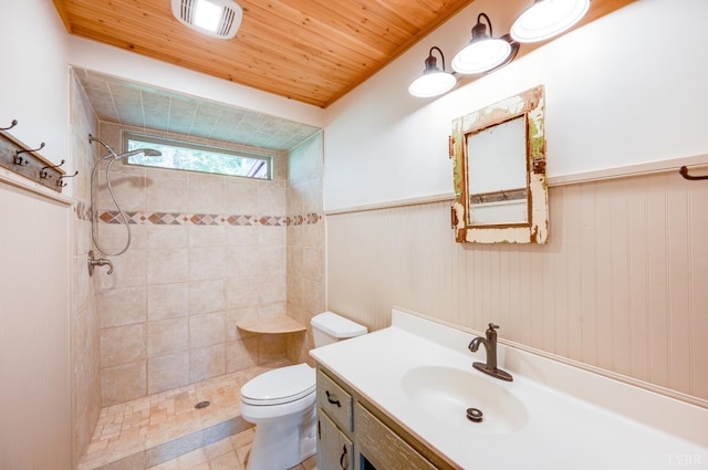 1343 Wares Gap Rd, Monroe, VA 24574 - full bathroom with a wainscoted wall, toilet, tiled shower, and wood ceiling