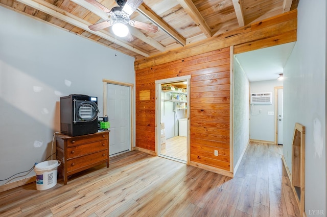 1343 Wares Gap Rd, Monroe, VA 24574 - bedroom with light wood-style flooring, beamed ceiling, wooden walls, an AC wall unit, and wood ceiling