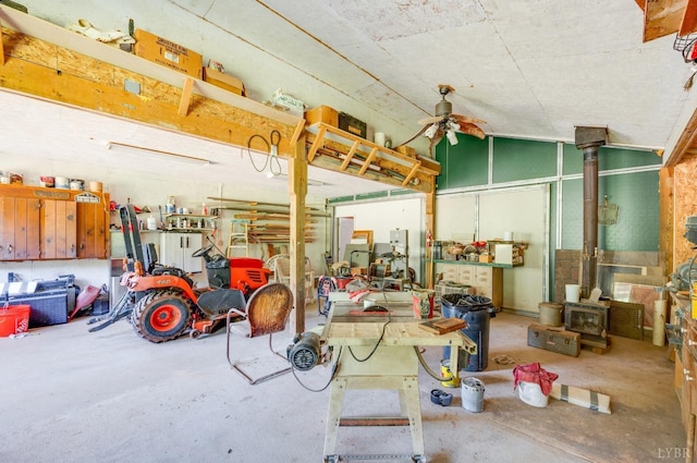 1343 Wares Gap Rd, Monroe, VA 24574 - garage with a wood stove and a ceiling fan