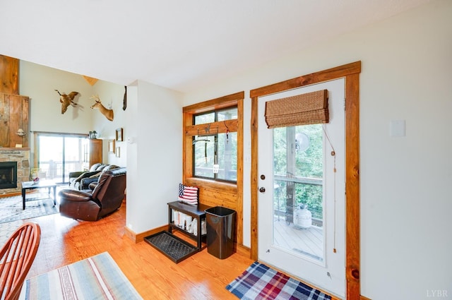1343 Wares Gap Rd, Monroe, VA 24574 - entryway featuring a stone fireplace, baseboards, and light wood-style floors