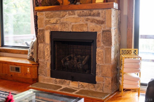 1343 Wares Gap Rd, Monroe, VA 24574 - interior details featuring wood finished floors, a stone fireplace, and visible vents