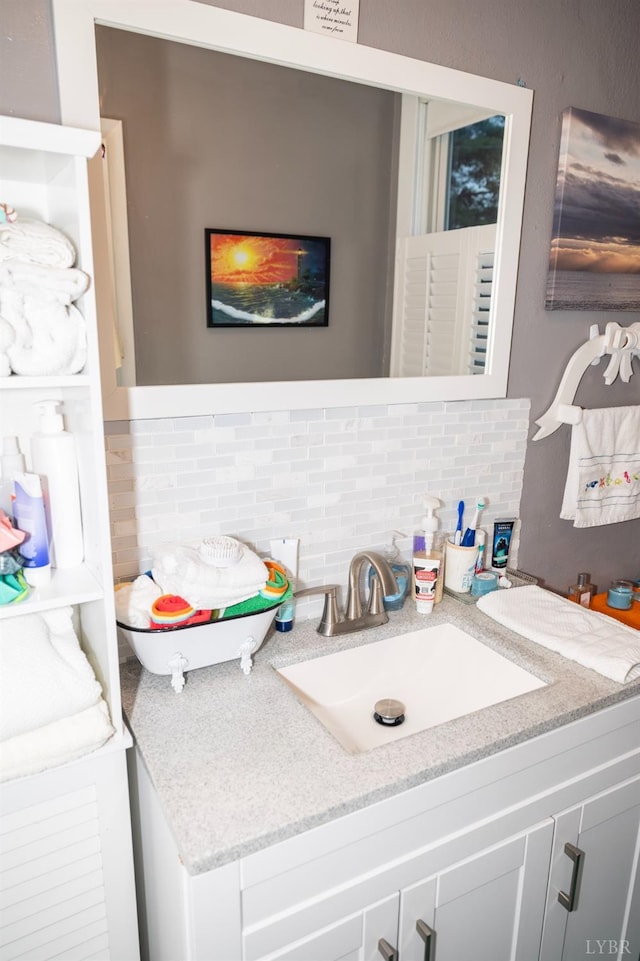 811 Broad St, Altavista, VA 24517 - bathroom with vanity, toilet, and decorative backsplash