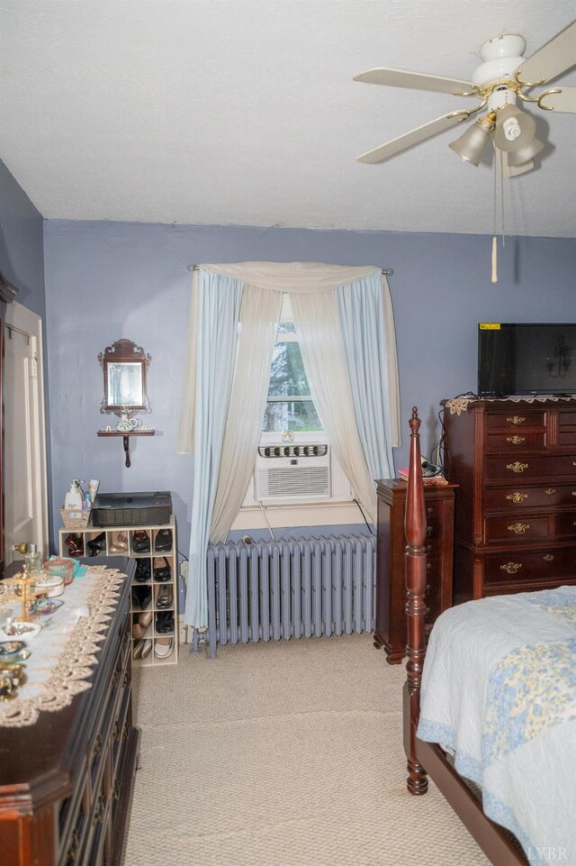 811 Broad St, Altavista, VA 24517 - bedroom featuring ceiling fan, light colored carpet, and radiator heating unit