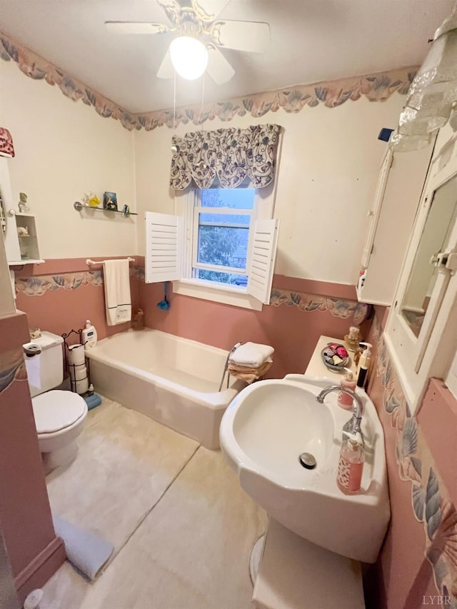 811 Broad St, Altavista, VA 24517 - bathroom with ceiling fan, independent shower and bath, toilet, and tile patterned floors