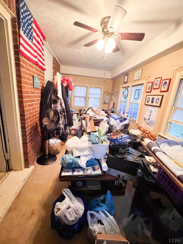 811 Broad St, Altavista, VA 24517 - bedroom featuring ceiling fan, brick wall, carpet floors, and ornamental molding