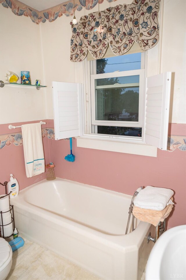 811 Broad St, Altavista, VA 24517 - bathroom featuring toilet and a washtub