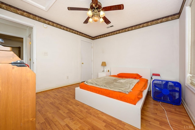 906 8th St, Lynchburg, VA 24504 - bedroom with wood finished floors, baseboards, a ceiling fan, and ornamental molding