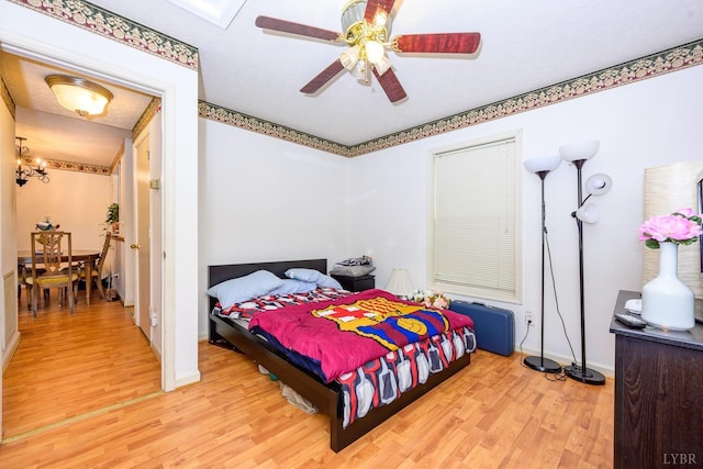 906 8th St, Lynchburg, VA 24504 - bedroom featuring light wood-type flooring, baseboards, and a ceiling fan