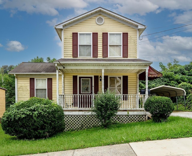 906 8th St, Lynchburg, VA 24504 - traditional home with covered porch, a detached carport, and a shingled roof