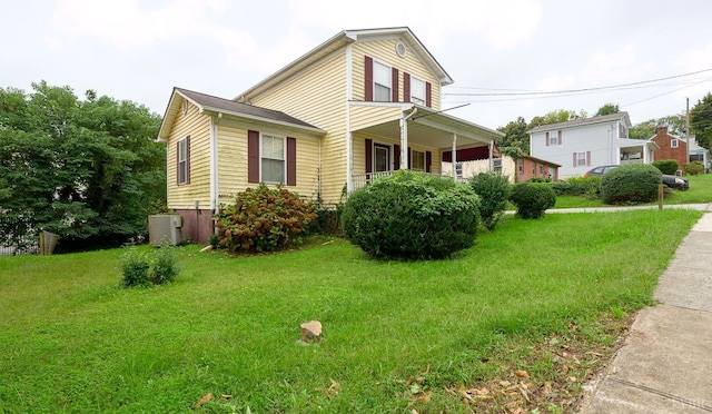 906 8th St, Lynchburg, VA 24504 - view of home's exterior with a yard, a porch, and central AC
