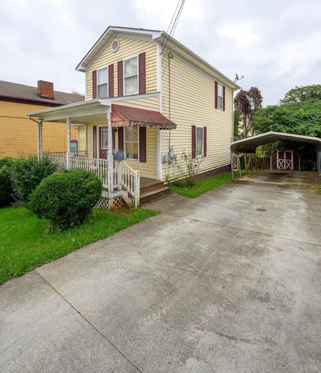 906 8th St, Lynchburg, VA 24504 - view of front of property featuring a porch, a detached carport, and concrete driveway