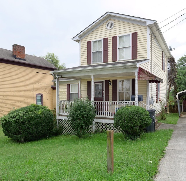 906 8th St, Lynchburg, VA 24504 - view of front facade featuring covered porch and a front yard