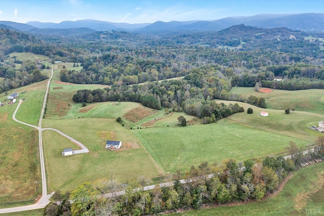aerial view with a mountain view and a rural view
