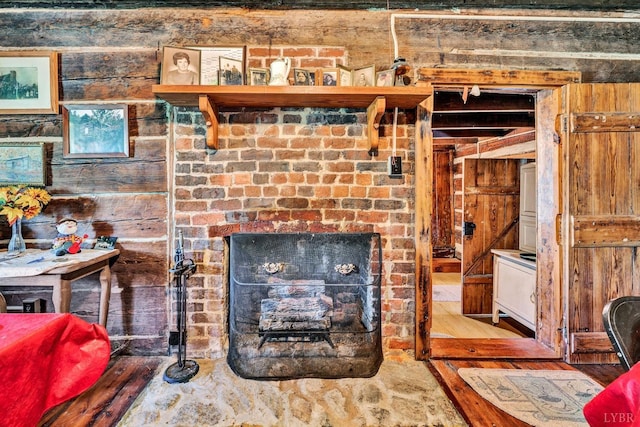 1155 Gaston Rd, Vinton, VA 24179 - living room featuring wood finished floors and wood walls
