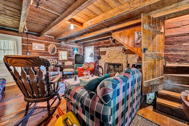1155 Gaston Rd, Vinton, VA 24179 - living room with wooden ceiling with exposed beams, hardwood / wood-style flooring, and wooden walls