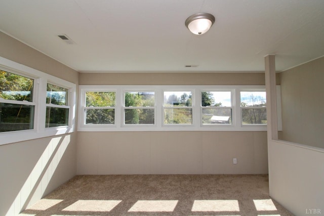 5427 Snake Creek Rd, Stuart, VA 24343 - unfurnished sunroom featuring visible vents, a healthy amount of sunlight, and carpet flooring