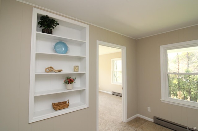 5427 Snake Creek Rd, Stuart, VA 24343 - hall with baseboard heating, baseboards, light carpet, and built in features