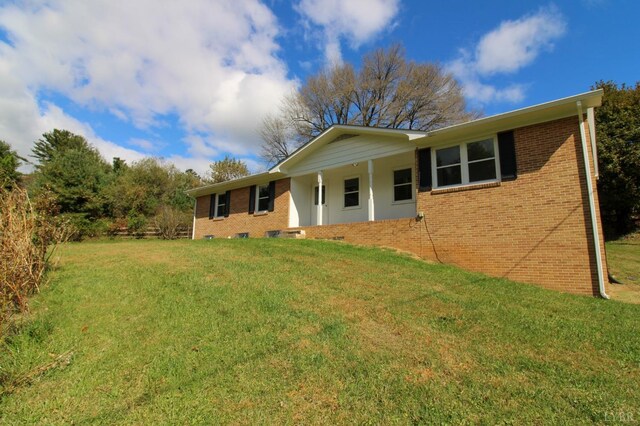 5427 Snake Creek Rd, Stuart, VA 24343 - view of front of property featuring a front yard and brick siding