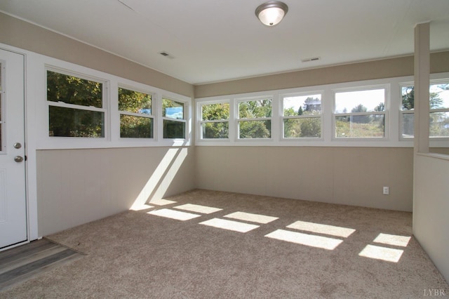 5427 Snake Creek Rd, Stuart, VA 24343 - unfurnished sunroom featuring visible vents, carpet flooring, and a healthy amount of sunlight