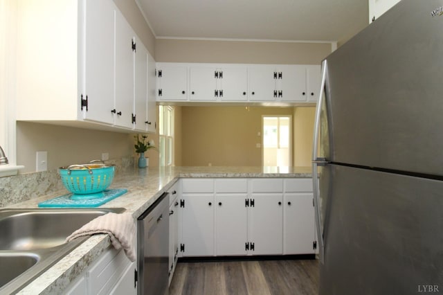 5427 Snake Creek Rd, Stuart, VA 24343 - kitchen with white cabinets, wood finished floors, appliances with stainless steel finishes, and a sink