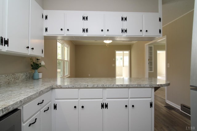 5427 Snake Creek Rd, Stuart, VA 24343 - kitchen with a peninsula, a wealth of natural light, and light countertops