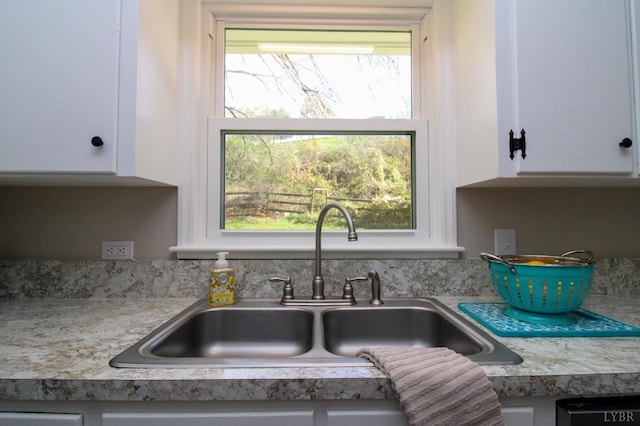 5427 Snake Creek Rd, Stuart, VA 24343 - room details featuring light countertops, white cabinets, and a sink