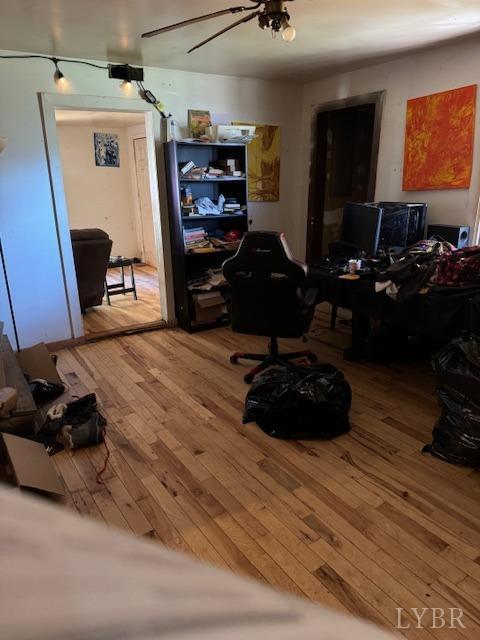 3535 Cabell Rd, Wingina, VA 24599 - dining room with wood-type flooring, a desk, and ceiling fan