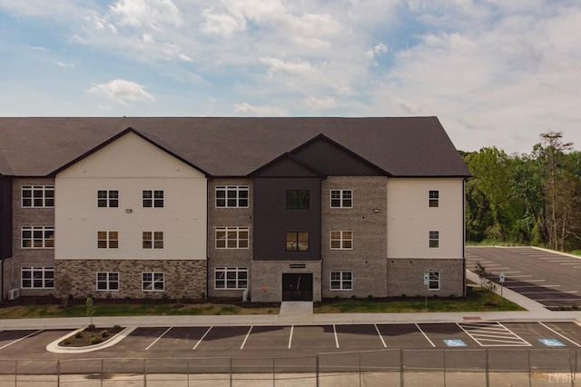 128 Brenleigh Ct Unit 306, Lynchburg, VA 24501 - view of property featuring uncovered parking