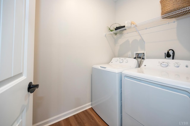 128 Brenleigh Ct Unit 306, Lynchburg, VA 24501 - washroom with independent washer and dryer, wood finished floors, and baseboards