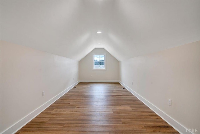 1161 Golf View Ct, Huddleston, VA 24104 - bonus room with vaulted ceiling, baseboards, wood finished floors, and recessed lighting