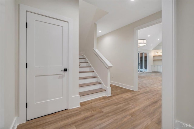 1161 Golf View Ct, Huddleston, VA 24104 - stairway with wood finished floors, recessed lighting, baseboards, and vaulted ceiling