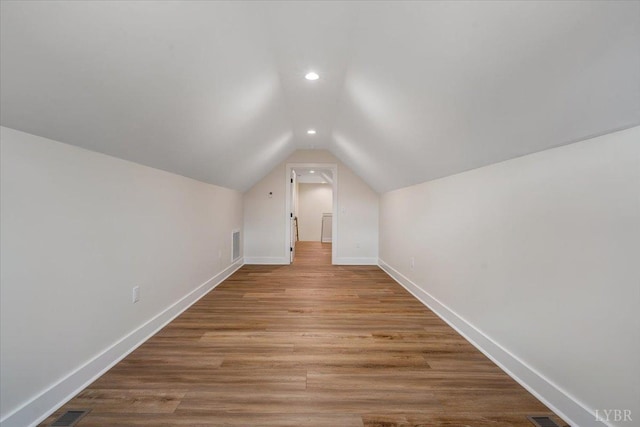 1161 Golf View Ct, Huddleston, VA 24104 - bonus room with recessed lighting, lofted ceiling, baseboards, and wood finished floors