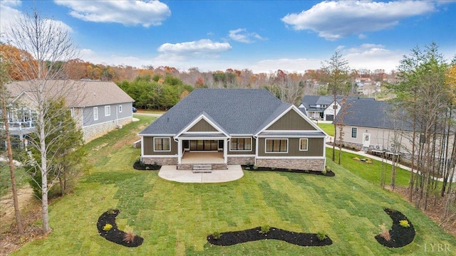 1161 Golf View Ct, Huddleston, VA 24104 - rear view of house featuring a patio area, stone siding, and a yard