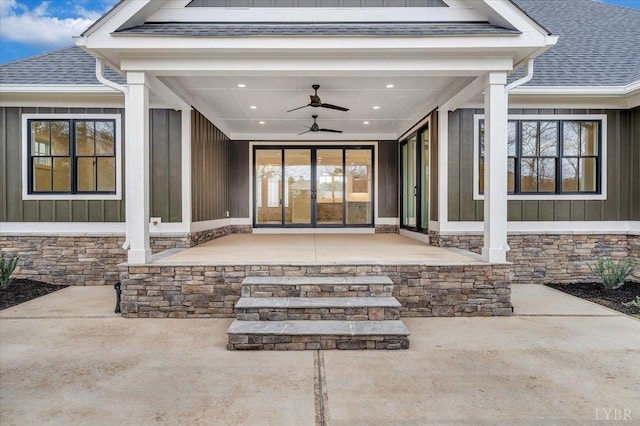 1161 Golf View Ct, Huddleston, VA 24104 - entrance to property with board and batten siding, stone siding, and a shingled roof