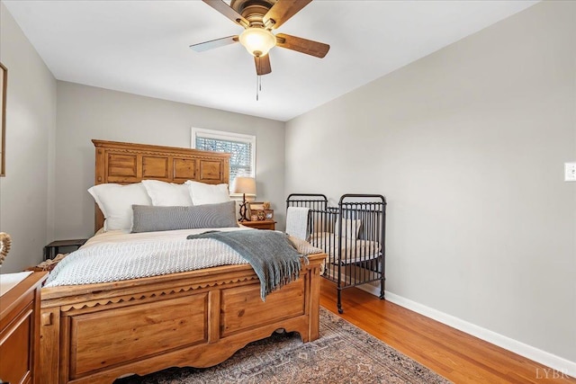 2180 Lime Plant Rd, Appomattox, VA 24522 - bedroom featuring wood finished floors, baseboards, and a ceiling fan