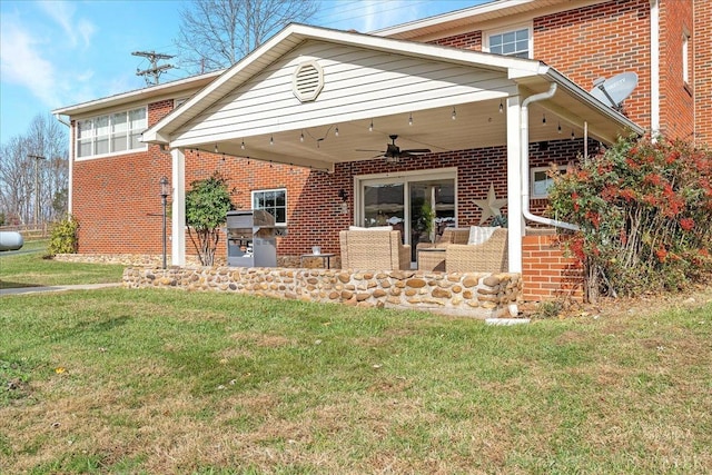 2180 Lime Plant Rd, Appomattox, VA 24522 - view of front of property featuring a ceiling fan, a front yard, brick siding, and a patio area