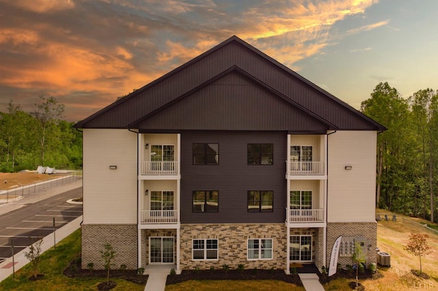 128 Brenleigh Ct Unit 308, Lynchburg, VA 24501 - rear view of property featuring central AC, a balcony, and stone siding